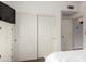 Cozy bedroom with a large closet and additional storage at 1201 E Le Marche Ave, Phoenix, AZ 85022