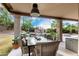Patio dining area with pool view at 1201 E Le Marche Ave, Phoenix, AZ 85022