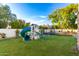 ' play area with slide, playset and trampoline at 2346 E Sanoque Ct, Gilbert, AZ 85298