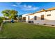 Large grassy backyard with playground and plenty of space at 2346 E Sanoque Ct, Gilbert, AZ 85298