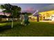 Gathering-friendly backyard with a playset and putting green at 2346 E Sanoque Ct, Gilbert, AZ 85298