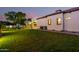 Landscaped backyard with a playset and plenty of grass at 2346 E Sanoque Ct, Gilbert, AZ 85298