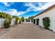 Landscaped backyard with a gravel pathway and lush greenery at 2346 E Sanoque Ct, Gilbert, AZ 85298