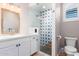 Clean bathroom with a walk-in shower and modern vanity at 2346 E Sanoque Ct, Gilbert, AZ 85298