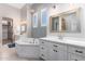 Spa-like bathroom with soaking tub, double vanity, and walk-in closet at 2346 E Sanoque Ct, Gilbert, AZ 85298