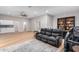 Spacious common area with kitchenette, recliner, and built-in office at 2346 E Sanoque Ct, Gilbert, AZ 85298