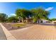 Luxury home with paver driveway and putting green at 2346 E Sanoque Ct, Gilbert, AZ 85298