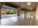 Spacious garage with open doors showing backyard view at 2346 E Sanoque Ct, Gilbert, AZ 85298