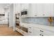 Modern kitchen with stainless steel appliances and tile backsplash at 2346 E Sanoque Ct, Gilbert, AZ 85298