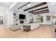 Bright living room with fireplace and wood beams at 2346 E Sanoque Ct, Gilbert, AZ 85298