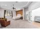 Large main bedroom with seating area and ensuite bathroom at 2346 E Sanoque Ct, Gilbert, AZ 85298