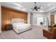 Spacious main bedroom with an accent wall and sitting area at 2346 E Sanoque Ct, Gilbert, AZ 85298