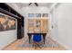 Home office with built-in shelving, large windows, and desk at 2346 E Sanoque Ct, Gilbert, AZ 85298