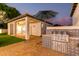 Built-in outdoor kitchen with stainless steel appliances and tile backsplash at 2346 E Sanoque Ct, Gilbert, AZ 85298