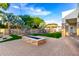 Fire pit and seating area on paved patio at 2346 E Sanoque Ct, Gilbert, AZ 85298