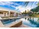 Resort-style pool with spa and lush landscaping at 2346 E Sanoque Ct, Gilbert, AZ 85298