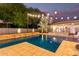 Relaxing swimming pool with a waterfall feature and plenty of lounge space at 2346 E Sanoque Ct, Gilbert, AZ 85298
