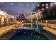 Inviting swimming pool with waterfall feature and lounge area at 2346 E Sanoque Ct, Gilbert, AZ 85298