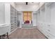 Custom walk-in closet with shelving, drawers, and a built-in desk at 2346 E Sanoque Ct, Gilbert, AZ 85298