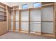 Large walk-in closet with ample shelving and hanging space at 2346 E Sanoque Ct, Gilbert, AZ 85298