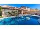 Enjoy this beautiful pool with a large patio and plenty of space for relaxation at 3219 E Wickieup Ln, Phoenix, AZ 85050