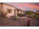 Landscaped backyard with desert plants and birdbath at 6202 E Mckellips Rd # 141, Mesa, AZ 85215