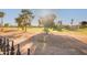 View of a lush green golf course from the backyard at 6202 E Mckellips Rd # 141, Mesa, AZ 85215