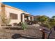 Landscaped backyard with seating area and birdbath at 6202 E Mckellips Rd # 141, Mesa, AZ 85215