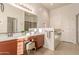 Spacious bathroom with double sinks, a soaking tub, and a walk-in shower at 6202 E Mckellips Rd # 141, Mesa, AZ 85215