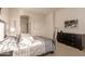 Bright bedroom with a large bed, dresser, and plenty of natural light at 6202 E Mckellips Rd # 141, Mesa, AZ 85215