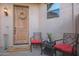 Small courtyard with seating area and decorative accents at 6202 E Mckellips Rd # 141, Mesa, AZ 85215