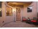 Inviting courtyard entry with seating and a welcoming door at 6202 E Mckellips Rd # 141, Mesa, AZ 85215