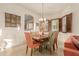 Bright dining area with wood table and comfortable seating at 6202 E Mckellips Rd # 141, Mesa, AZ 85215