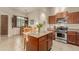 Kitchen boasts granite countertops, stainless steel appliances, and an island at 6202 E Mckellips Rd # 141, Mesa, AZ 85215