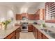Modern kitchen with stainless steel appliances and granite countertops at 6202 E Mckellips Rd # 141, Mesa, AZ 85215