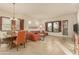 Open living room with tile floors, comfortable seating, and access to patio at 6202 E Mckellips Rd # 141, Mesa, AZ 85215