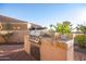 Outdoor kitchen with grill and prep area at 6202 E Mckellips Rd # 141, Mesa, AZ 85215