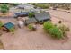 Aerial view of a house with solar panels and a large yard at 28216 N 148Th St, Scottsdale, AZ 85262