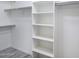 Large walk-in closet with shelving and hanging rods at 3473 E Bruce Ave, Gilbert, AZ 85234