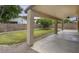 Covered patio overlooking a grassy backyard at 3473 E Bruce Ave, Gilbert, AZ 85234