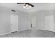 Main bedroom with wood-look flooring and access to the bathroom at 3473 E Bruce Ave, Gilbert, AZ 85234