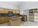 Kitchen with island, stainless steel appliances, and granite countertops at 3473 E Bruce Ave, Gilbert, AZ 85234