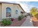 Attractive exterior of a house with a walkway and landscaping at 8140 N 107Th Ave # 129, Peoria, AZ 85345