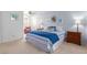 Bright bedroom with a king-size bed and relaxing sitting area at 8140 N 107Th Ave # 129, Peoria, AZ 85345