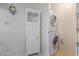Stackable washer and dryer in a small laundry closet at 8140 N 107Th Ave # 129, Peoria, AZ 85345
