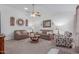 Comfortable living room with neutral color palette and ceiling fan at 8140 N 107Th Ave # 129, Peoria, AZ 85345