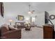 Spacious living room with ample natural light and comfortable seating at 8140 N 107Th Ave # 129, Peoria, AZ 85345