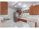 Modern kitchen featuring stainless steel appliances and granite countertops at 8140 N 107Th Ave # 129, Peoria, AZ 85345