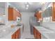 Clean and efficient kitchen with ample counter space and cabinets at 8140 N 107Th Ave # 129, Peoria, AZ 85345