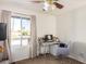 Bedroom with window seating, a desk, and a comfortable office chair at 4021 W Hatcher Rd, Phoenix, AZ 85051